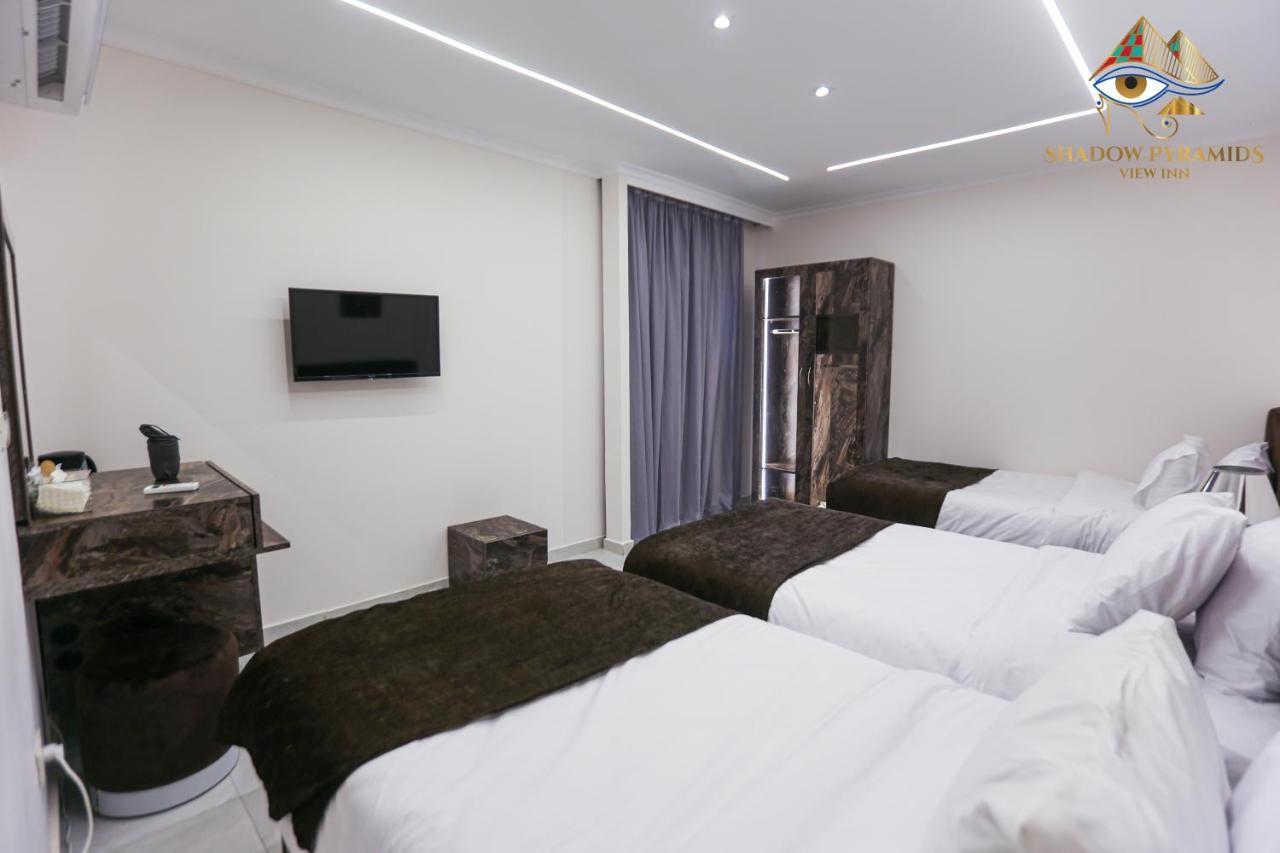 Shadow Pyramids Suites And Jacuzzi Kafret el-Gabal Exteriör bild