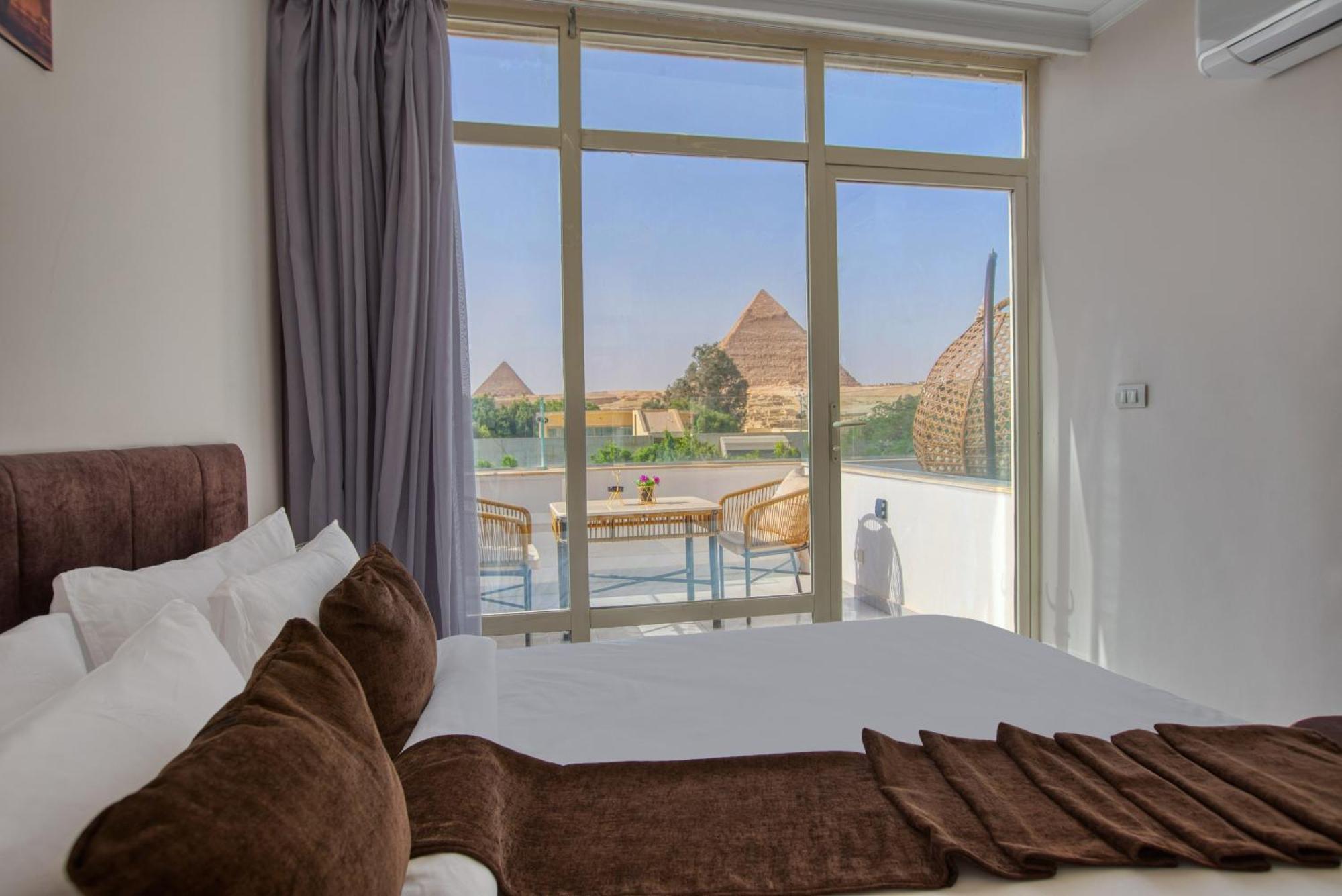 Shadow Pyramids Suites And Jacuzzi Kafret el-Gabal Exteriör bild
