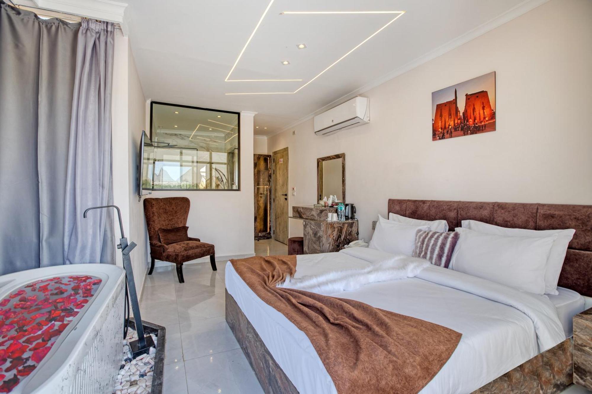 Shadow Pyramids Suites And Jacuzzi Kafret el-Gabal Exteriör bild